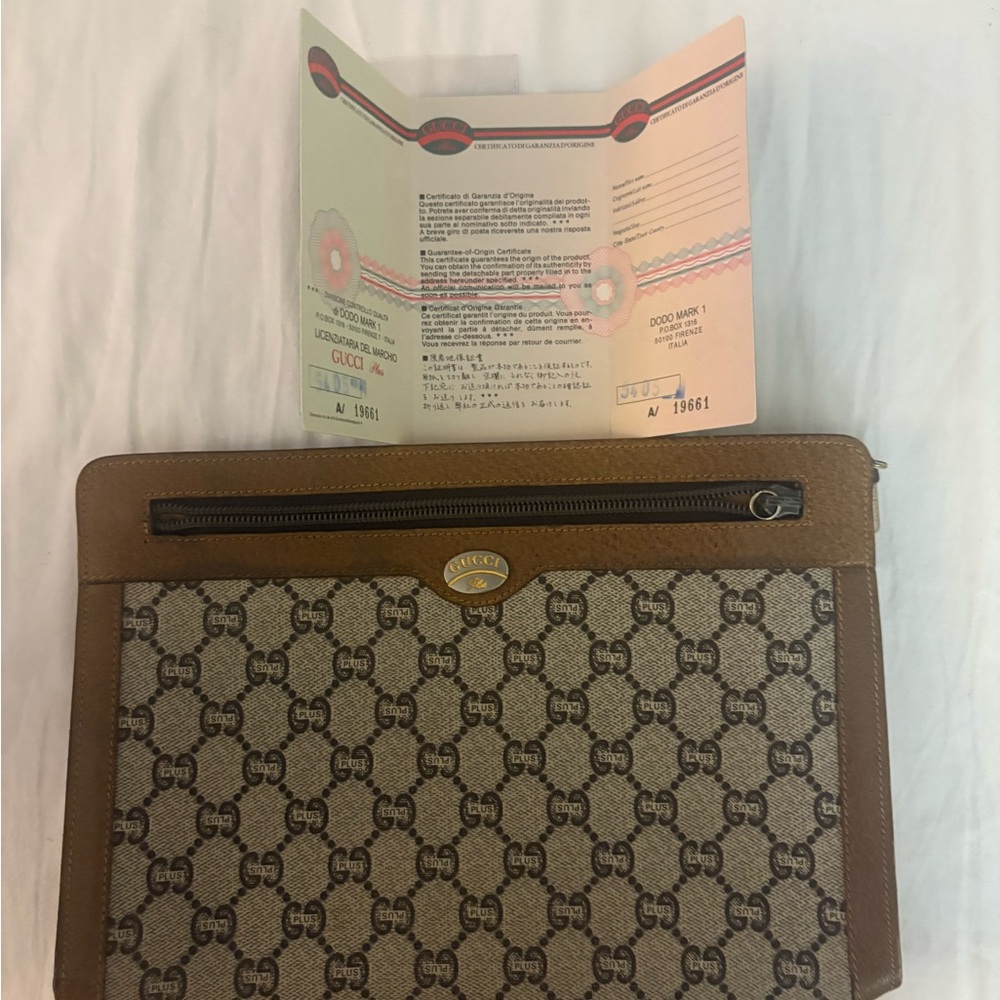 Authentic Gucci Gold and Brown Zippered Pouch COA included